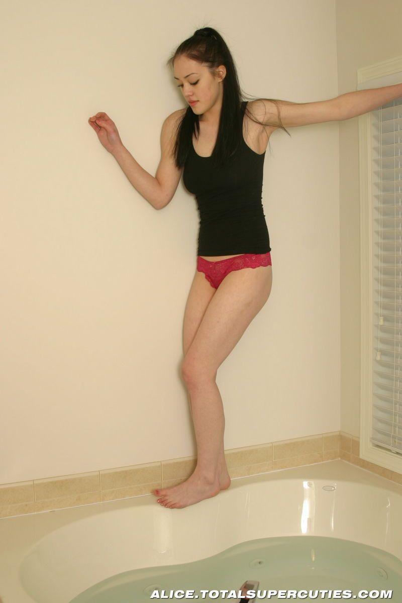 Pictures of a hot teen girl getting wet in the tub #52989294