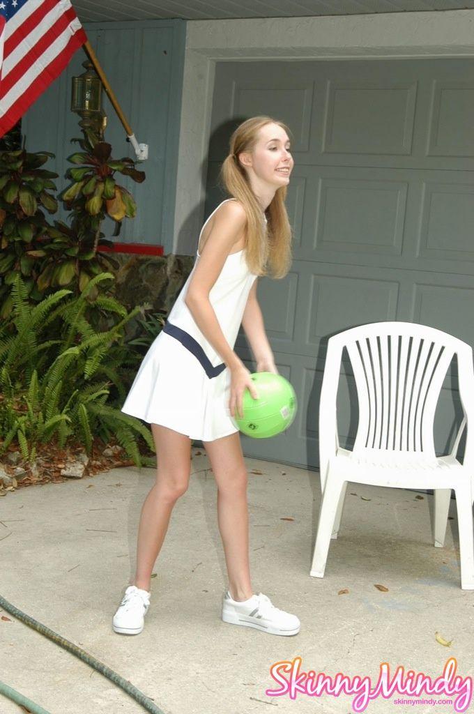 Pictures of teen cheerleader Skinny Mindy playing ball in her driveway #59978216