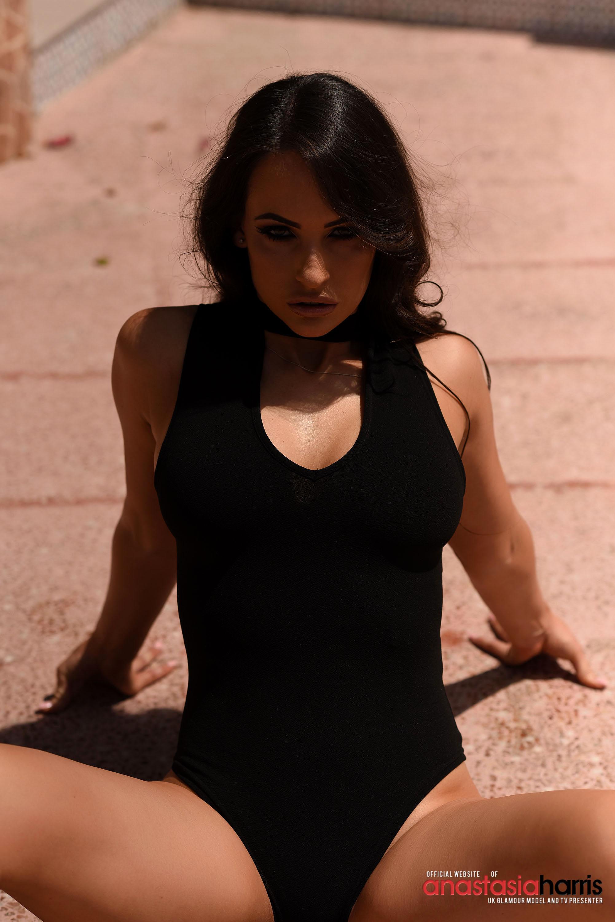 Anastasia in her black bodysuit outdoors #53123351