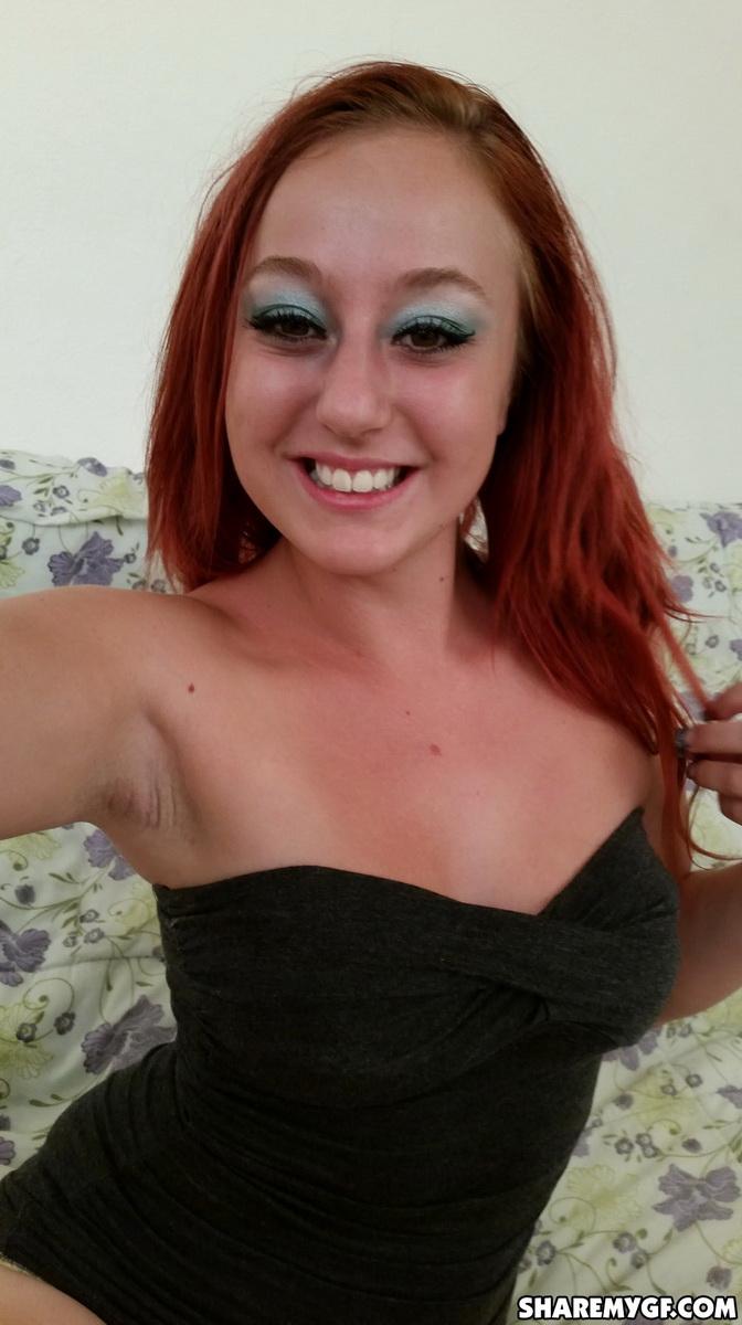 Redhead GF takes selfies of her round boobs and ass #60788979