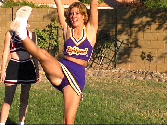 Pictures of cheerleaders doing their moves outside #60578346