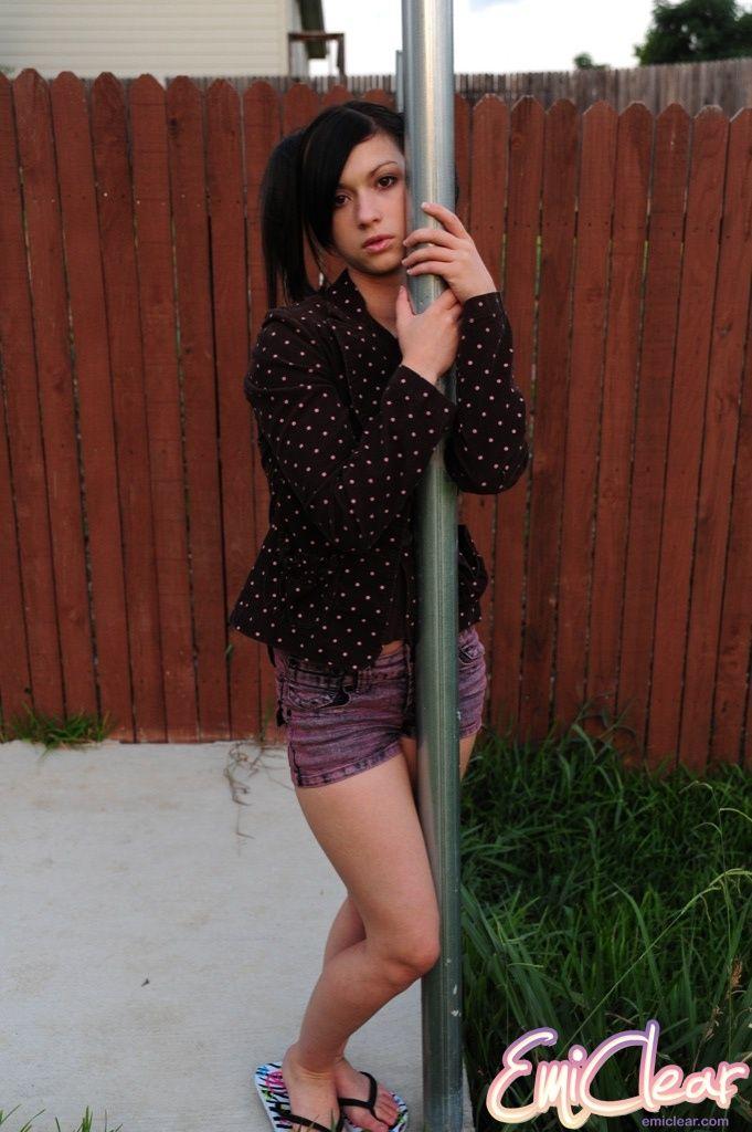 Pictures of Emi Clear working a pole in the back yard #54183163