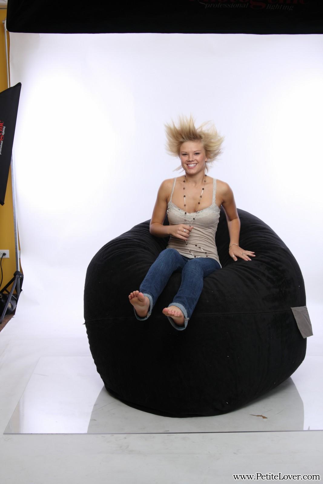 Petite blonde girl Tiffany teases on a bean bag #60075509