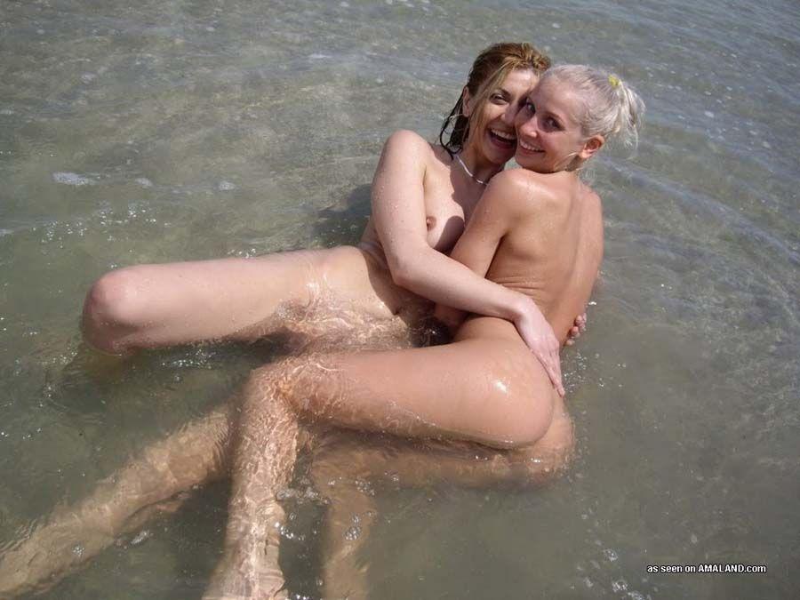 Pictures of two hot teens eating pussy on a beach #60652281