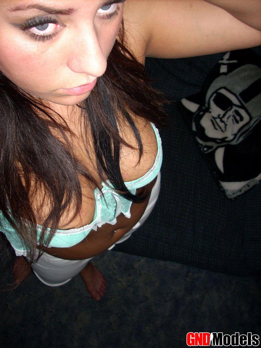 Pictures of a sexy brunette girl taking pics of herself #60502521