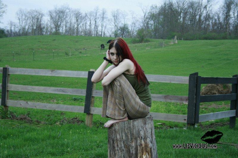 Liz Vicious strips slowly on a farm #59035591