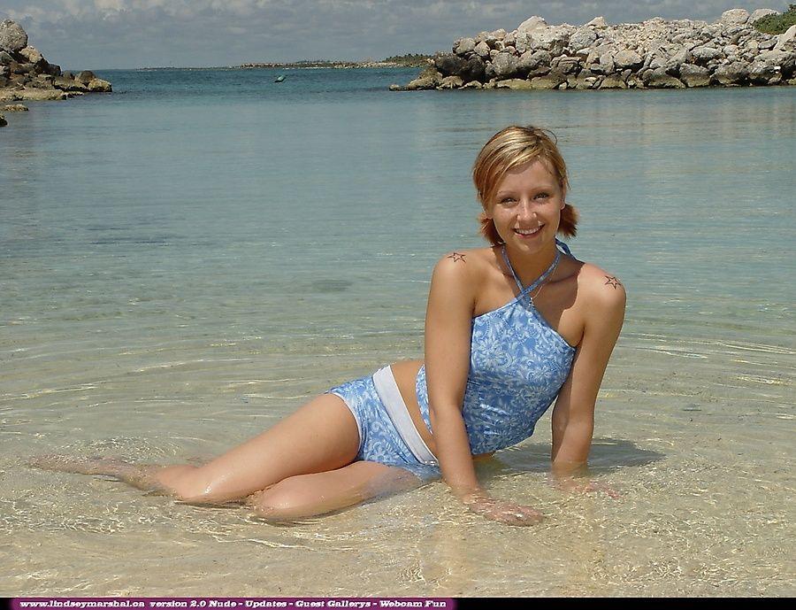 Pictures of teen Lindsey Marshal going for a skinny dip on a beach #58971566