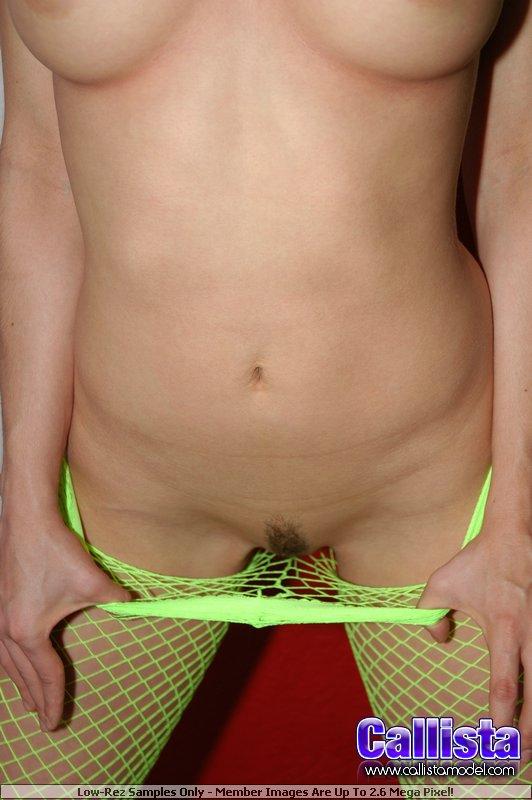 Pictures of teen slut Callista Model teasing in green fishnets #53607547