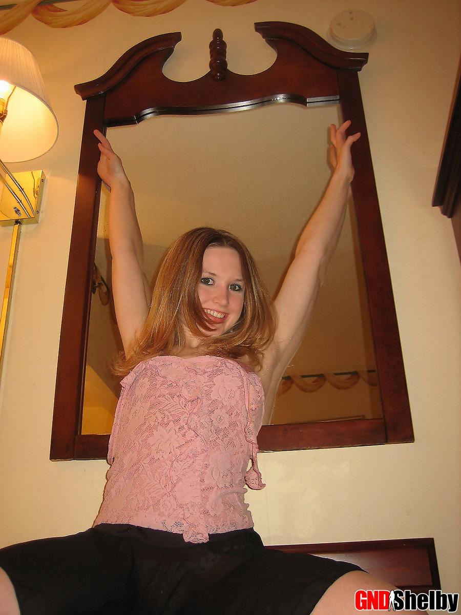 Petite teen Shelby strips naked in front of her hotel mirror and begins to finger her tight little pussy #58761759
