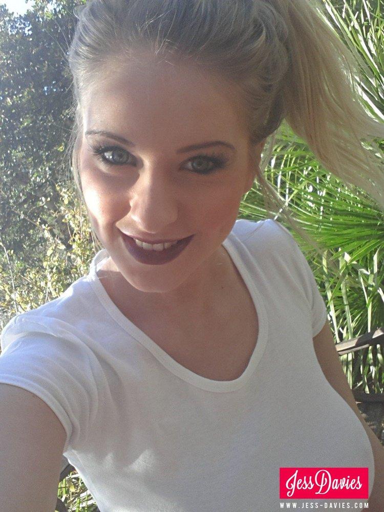 Jess Davies pulls up her tight white top to reveal her beautiful breasts #55394058