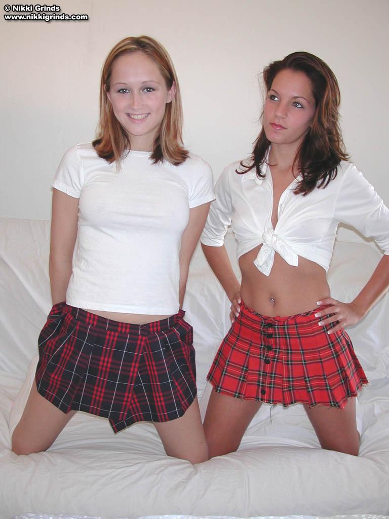 Pictures of two schoolgirls getting nude together #59780088