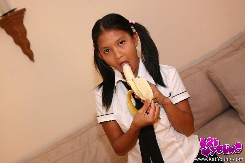 Kat Young strips wearing a school girl uniform #58043476