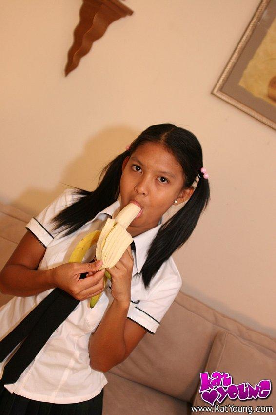 Kat Young strips wearing a school girl uniform #58043505