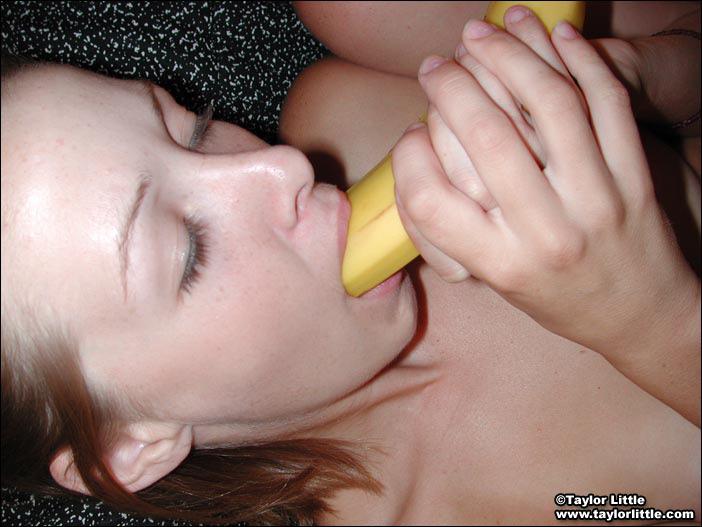 Pictures of two cheerleaders sharing a banana #60069759