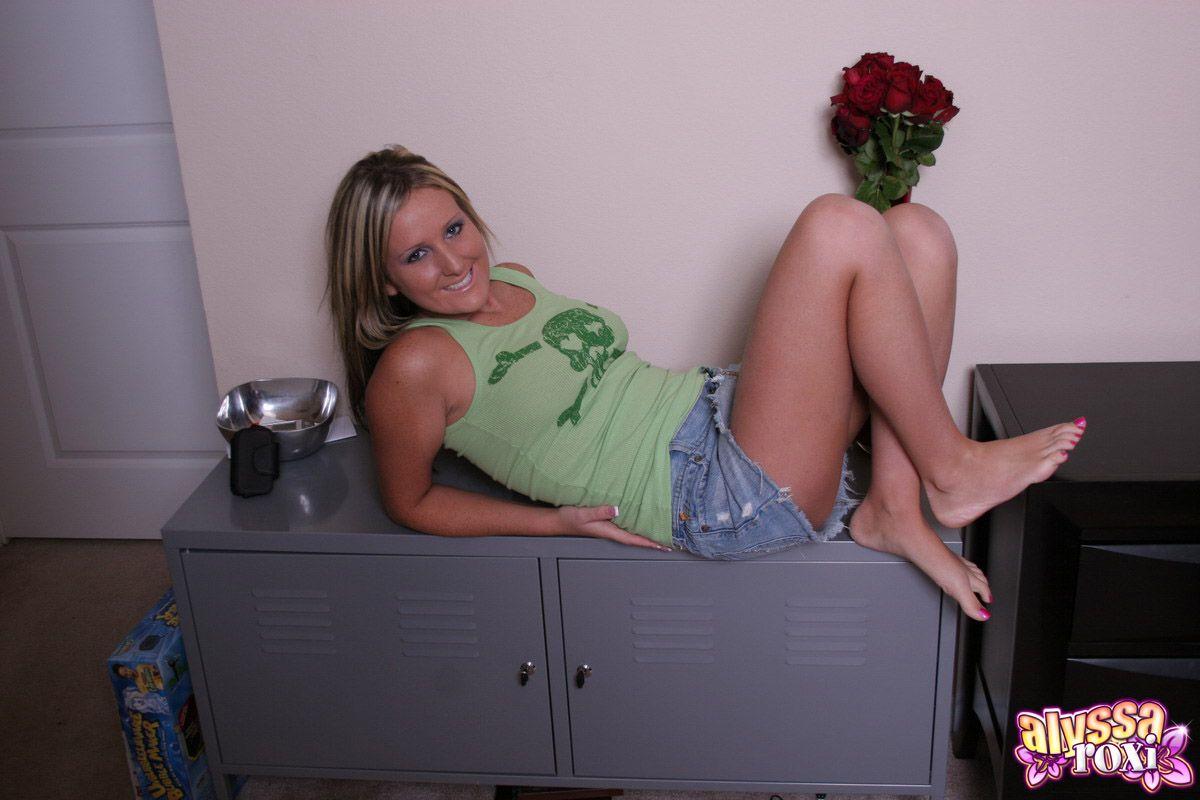 Pictures of teen Alyssa Roxi stripping for fun in the living room #53062634