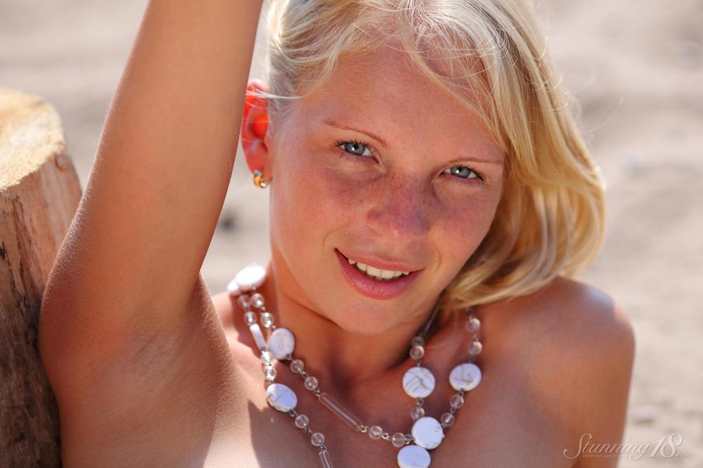 Beautiful blonde teen Olga W shows you her tight pussy on the beach in "Scaffold" #60829456
