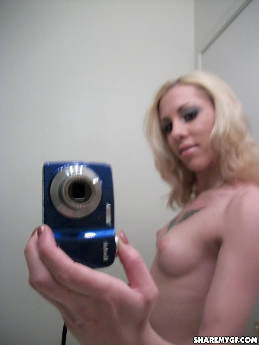 Tattooed skinny blonde girlfriend takes selfshot pictures in the mirror of her perky tits #60791152