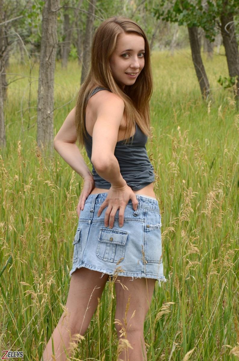 Beautiful teen Jamie strips out of her denim skirt outside #55068482