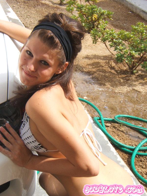 Pictures of Jody Love fixing her car in a bikini #55568689